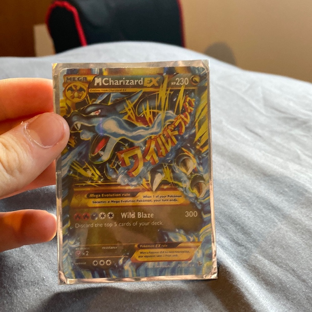 I’m selling this amazing M Charizard EX Pokémon